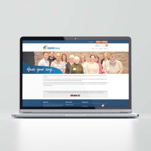 image of laptop showcasing GWM Water website, banner with several employees from company and following text under image