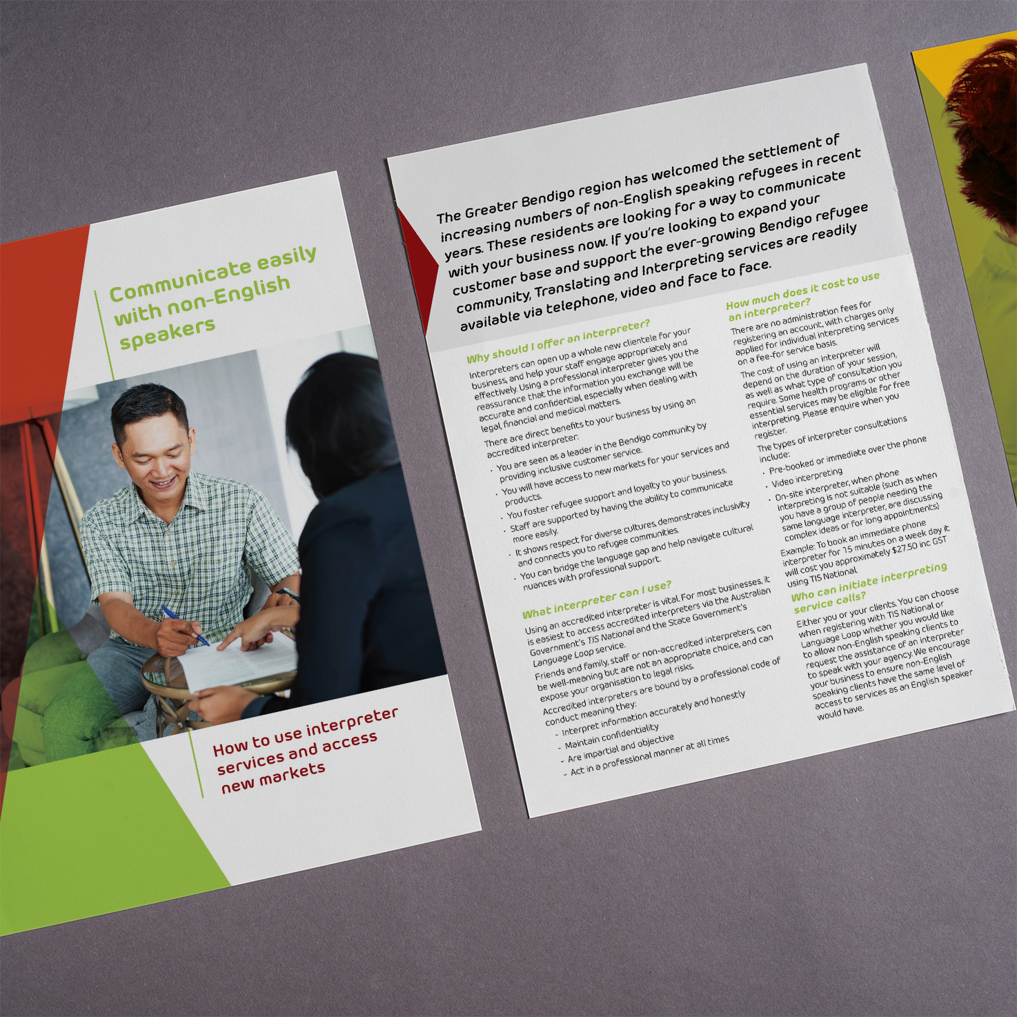 Portrait flyer with man signing document in front of woman along side page with text, using red and green colours on document.